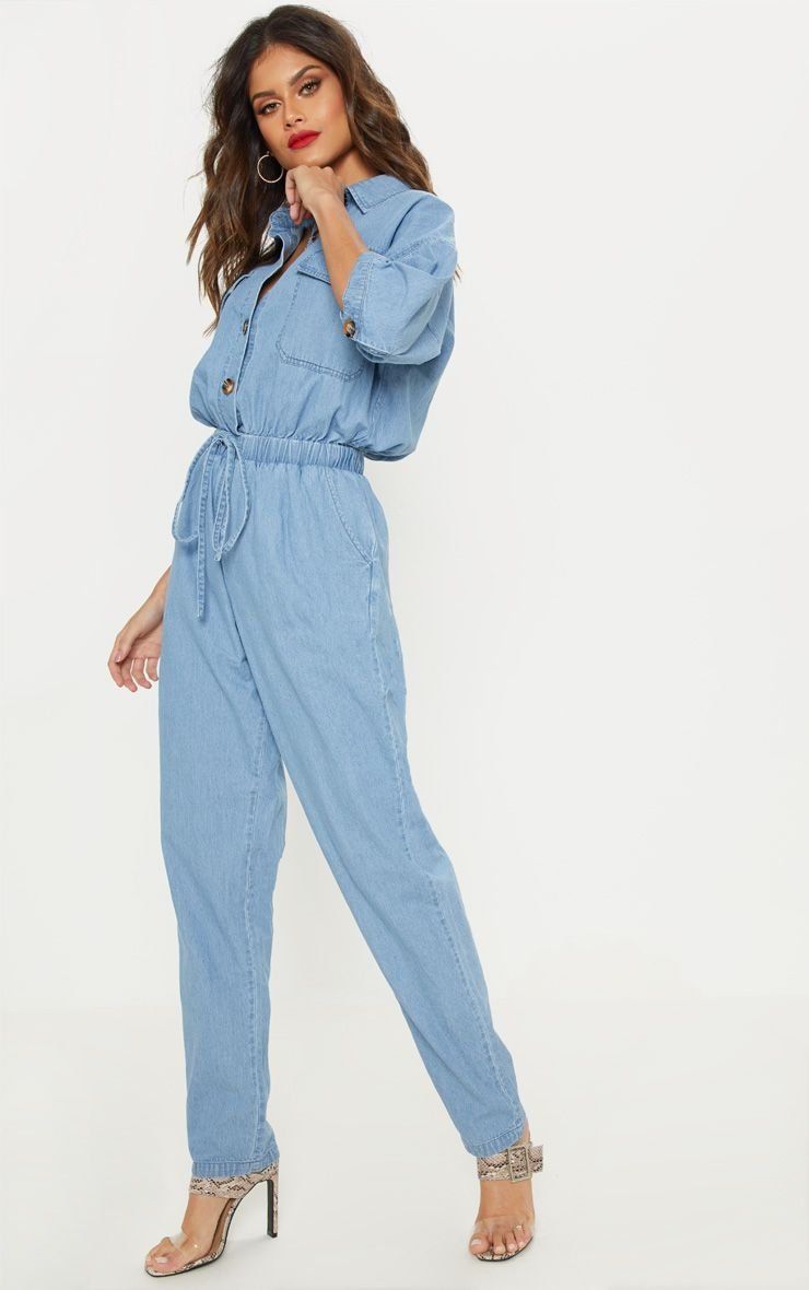 Stylish jeans jumpsuit with turtle buttons and elasticated belt