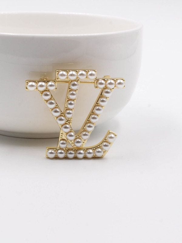 Louis Vuitton LV Logo Brooch  Rent Louis Vuitton jewelry for $55/month
