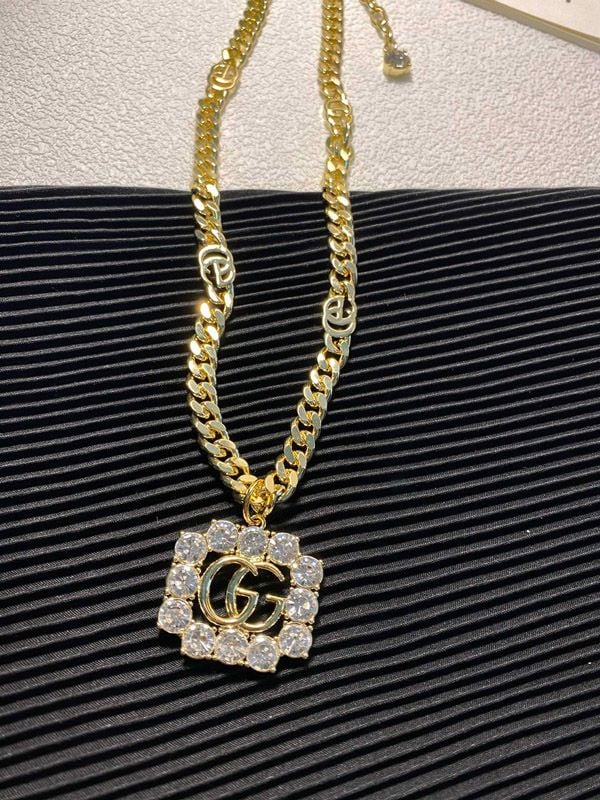 Iced out clearance gucci pendant