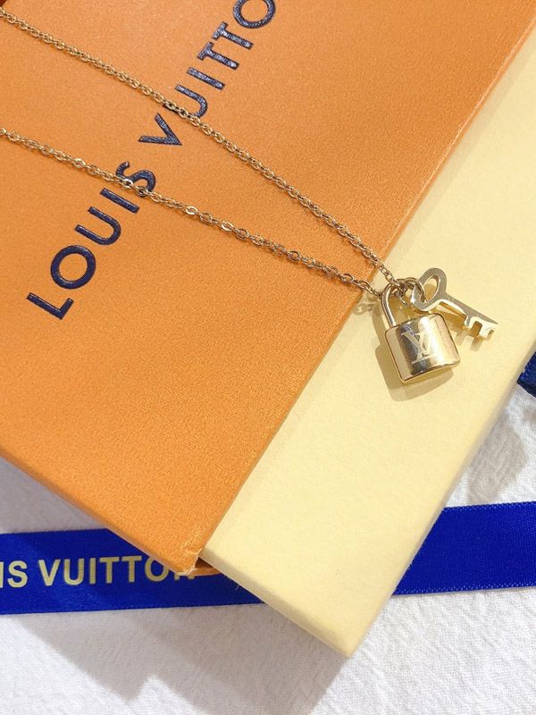 Louis Vuitton Gold Lock Necklace | Natural Resource Department