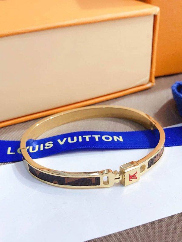 Louis Vuitton bracelet with a red logo