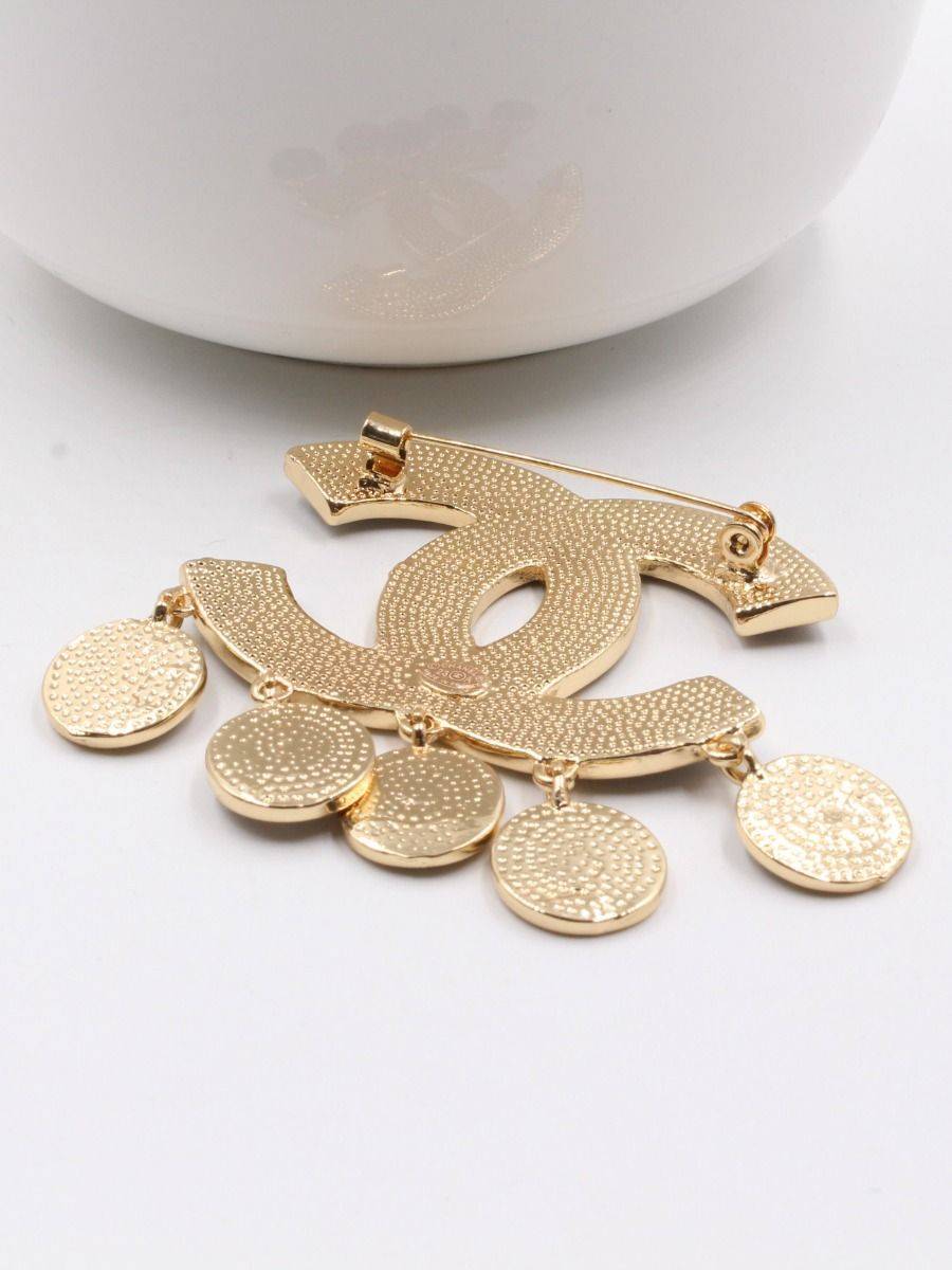 Large black Chanel brooch