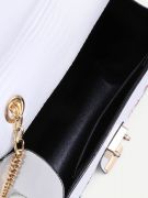 A white leather bag with a floral pattern-1