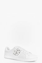 An athletic shoe studded with diamonds and pearls-1