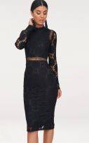 The long sleeve dress is in navy blue from Preti-7