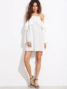 A white dress with open sleeves and a pouch on the sleeves-2