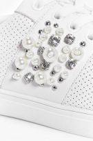 An athletic shoe studded with diamonds and pearls-4