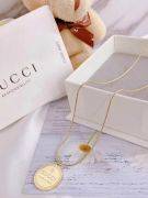 Gucci gold circle logo necklace-1