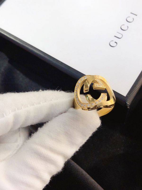 Gucci large gold logo ring