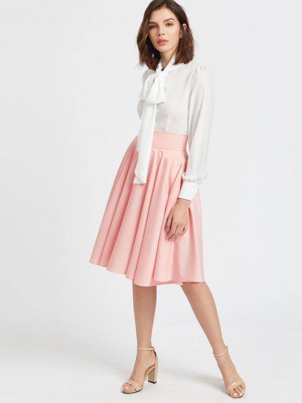 The skirt is ruffled from the pink medium