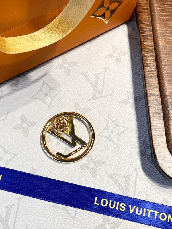 Louis Vuitton gold metal brooch