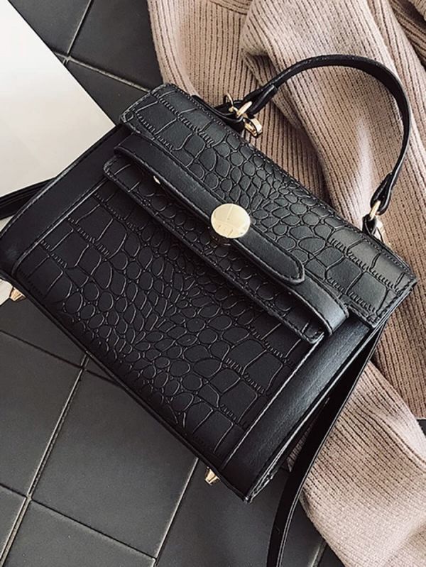An elegant bag with a snake skin