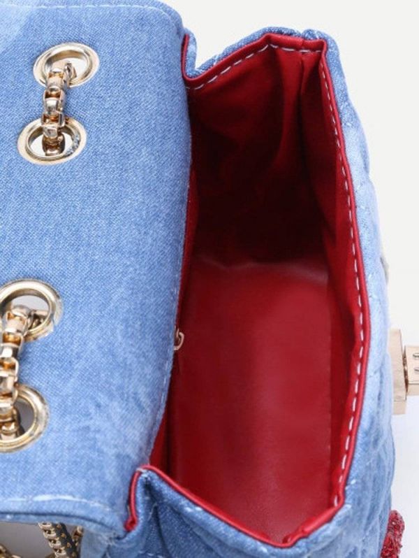 A bag with a chain of blue denim