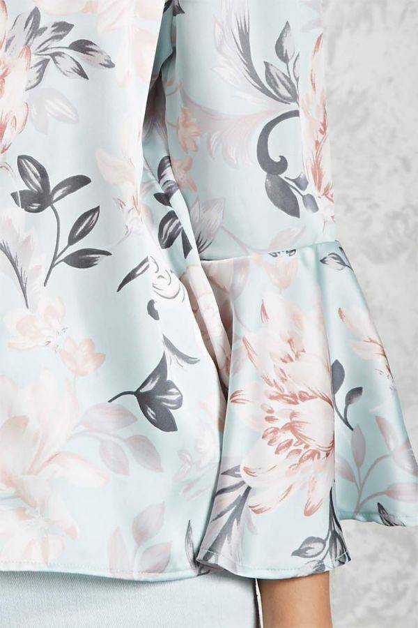A blouse of satin with a floral print