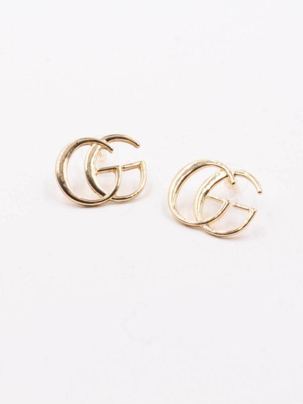 Gold gucci earring