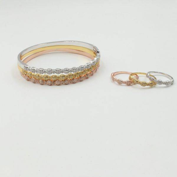 A series of fences and rings colored cubic zirconia