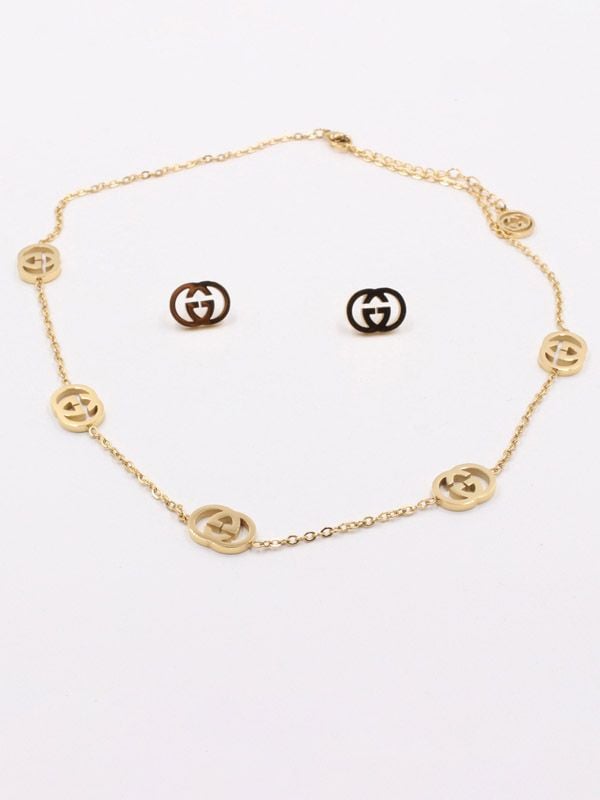 Gucci set, golden soft necklace and earring