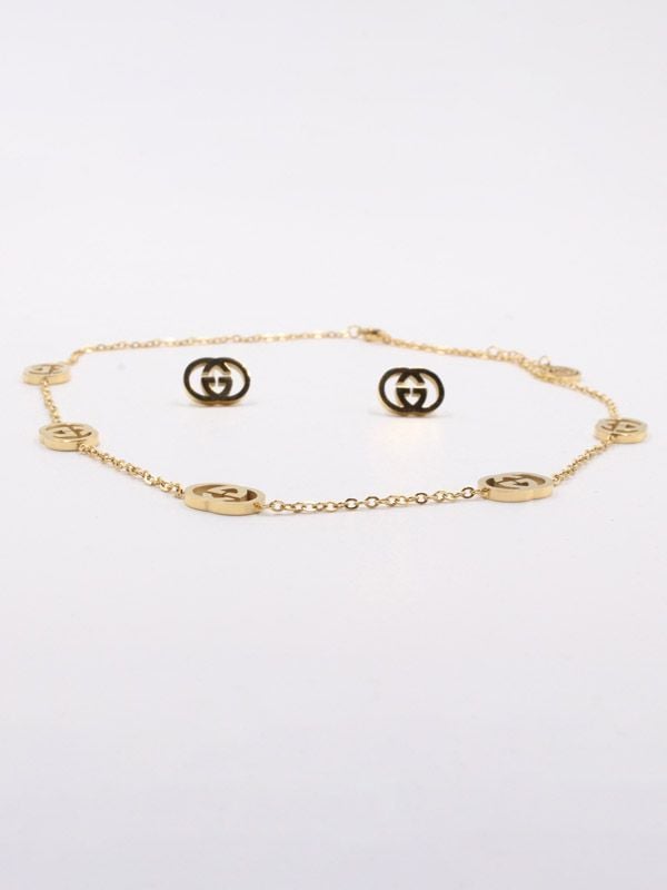 Gucci set, golden soft necklace and earring