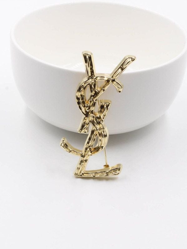 Large Yves Saint Laurent brooch