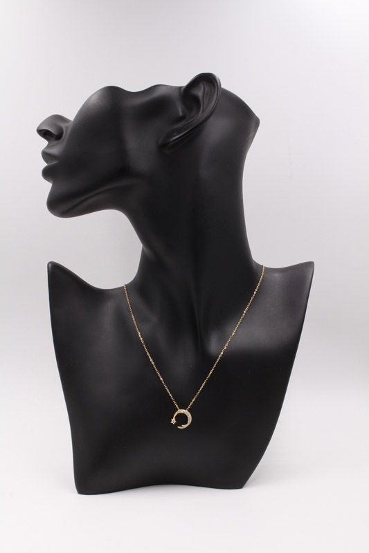 A crescent and star zircon gold chain