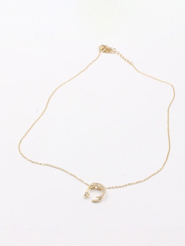 A crescent and star zircon gold chain