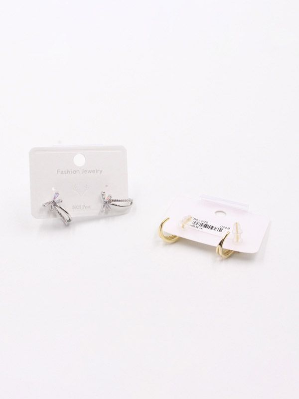 A curved butterfly zircon earring
