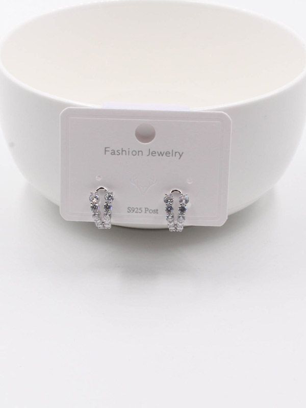 Curved cubic zirconia earring