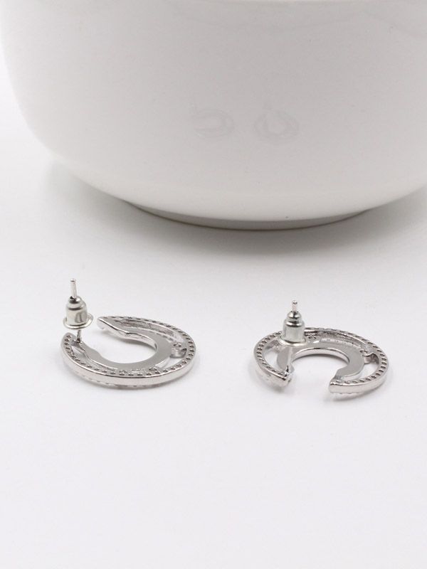 Messika earring, round zircon, gold and silver