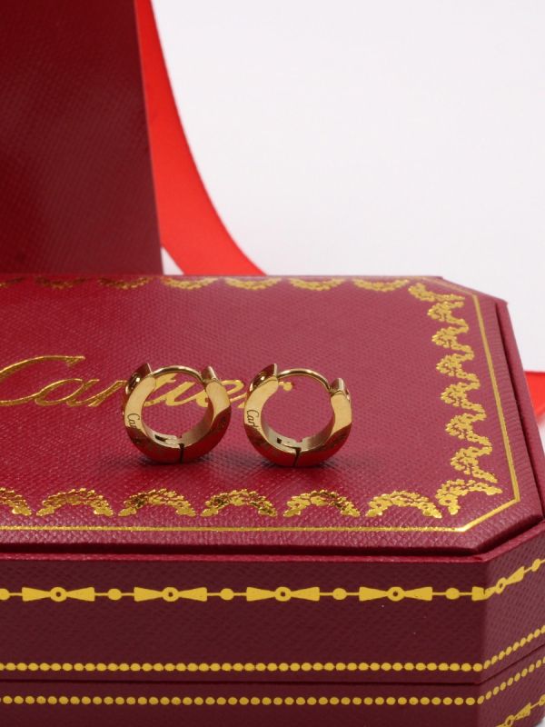 Round gold clip-on Cartier earring