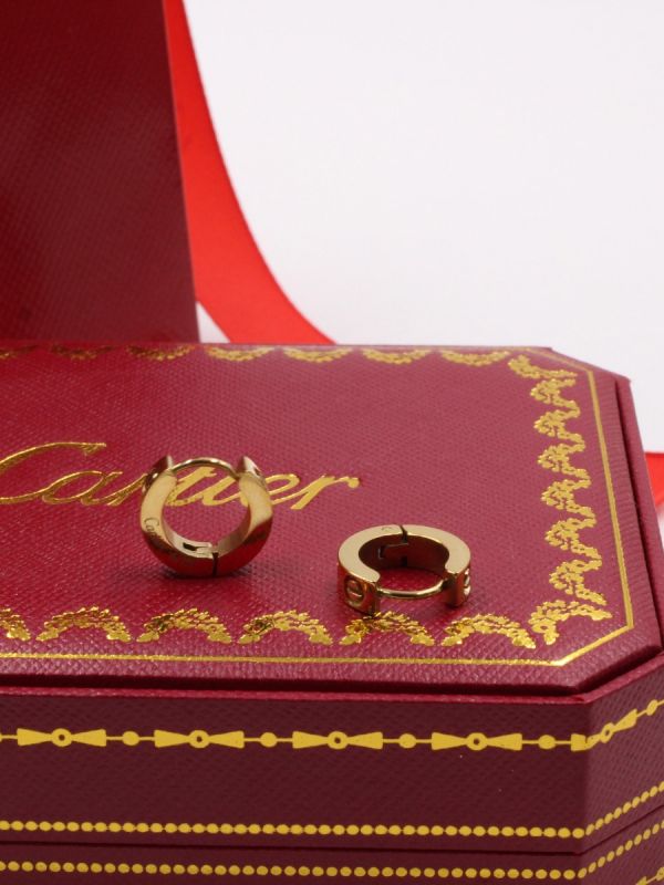 Round gold clip-on Cartier earring
